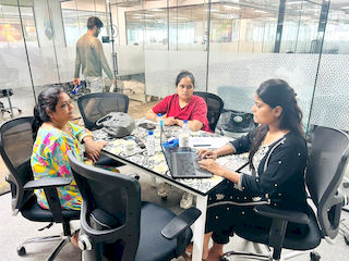 upGrad Indore Office - student and parents with the counselling team after their study abroad session